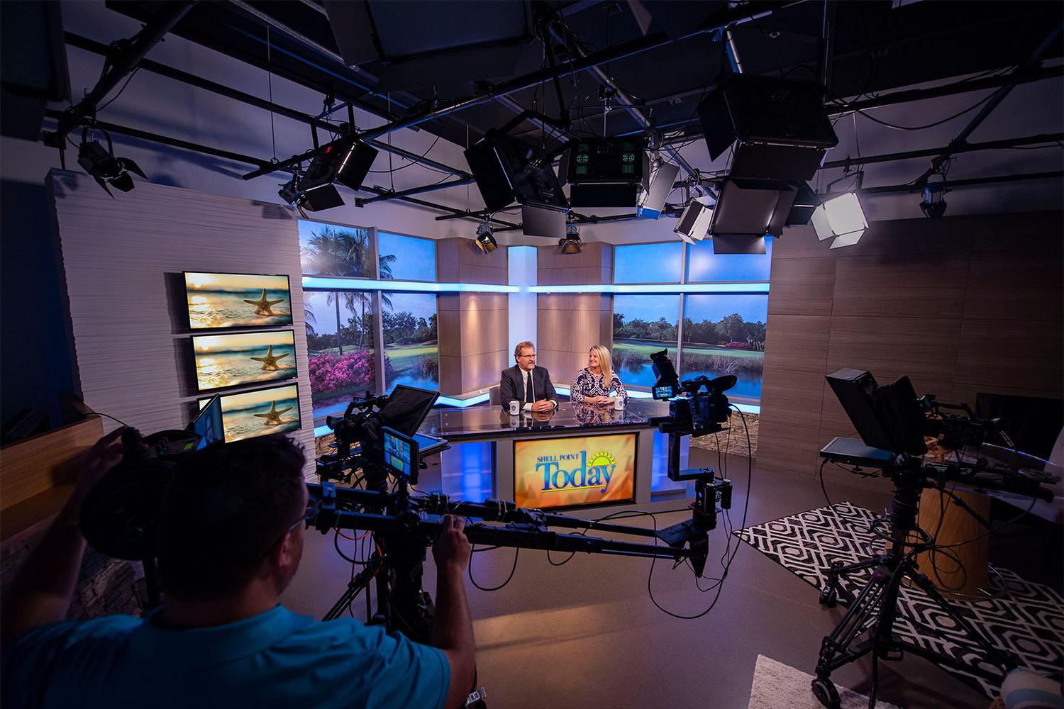 Complete broadcast studio for a retirement community featuring our Three Piece Modular Desk
